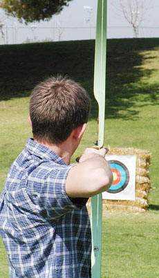 TJ Stone lines up his shot on the Tuesday and Thursday archery class.