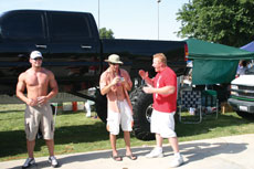 Kent Porter the owner of Krazy Kustomz dances in front of his truck at the annual Beer Fest at Stramler Park.