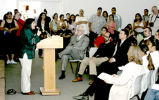 Lori Deleon, the daughter of United Farm Workers union co-founder Dolores Huerta, talks to an audience that filled the Fireside Room on Cesar Chavez Day.