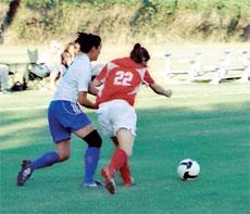 BC's Lisa Boothe (#22) steals the ball from a  Santa Monica player on Oct. 24. BC and Santa Monica played to a 1-1 tie.