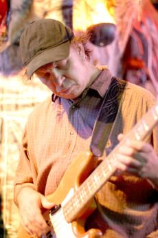 Mark Powell plays bass alongside Aaron Novak at the Rockstar Party Bar on Meany Avenue Wed. Oct. 29 2008.