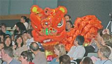 The Lion Dance is demonstrated by the Golden Lion Studio. Many people gather around to watch the four dragons dance. The dragons, supported by two different people danced on stage and on the auditorium.