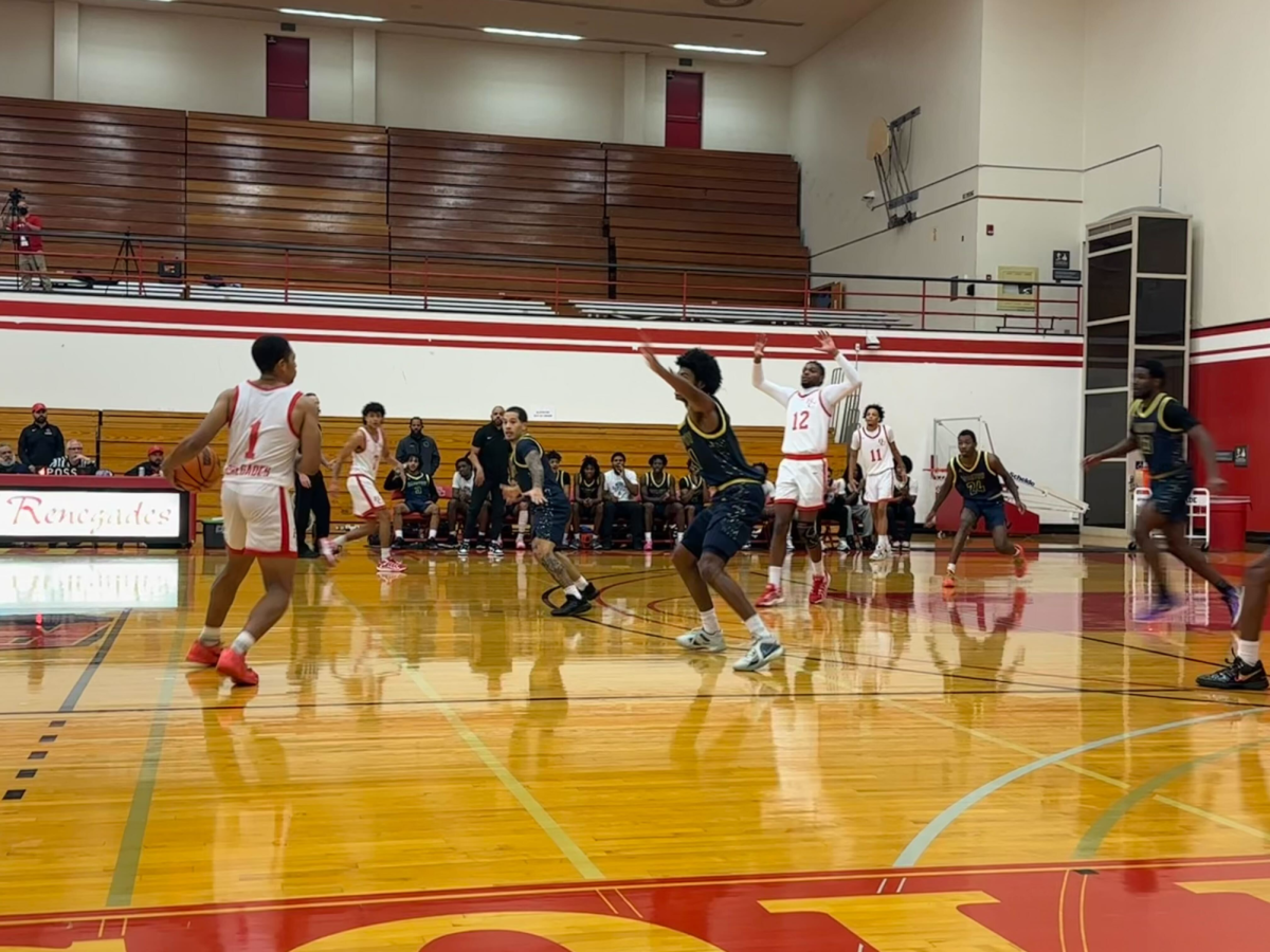 Isaiah Perry (1) setting up a play against the Barstow Vikings