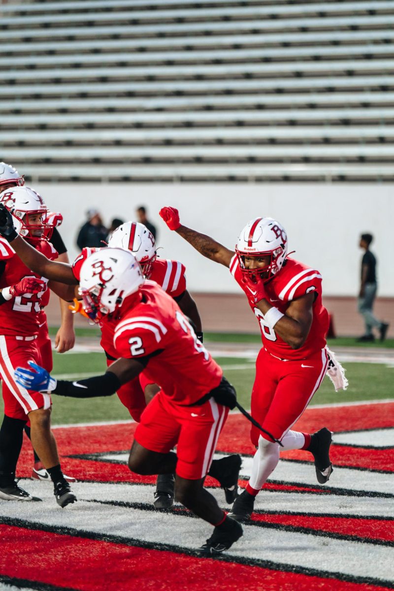 BC receivers Mekhi Smith (1), Jalen Richmond (8), and Jacoby Pointer (2) celebrate in the end zone after Richmond's touchdown.