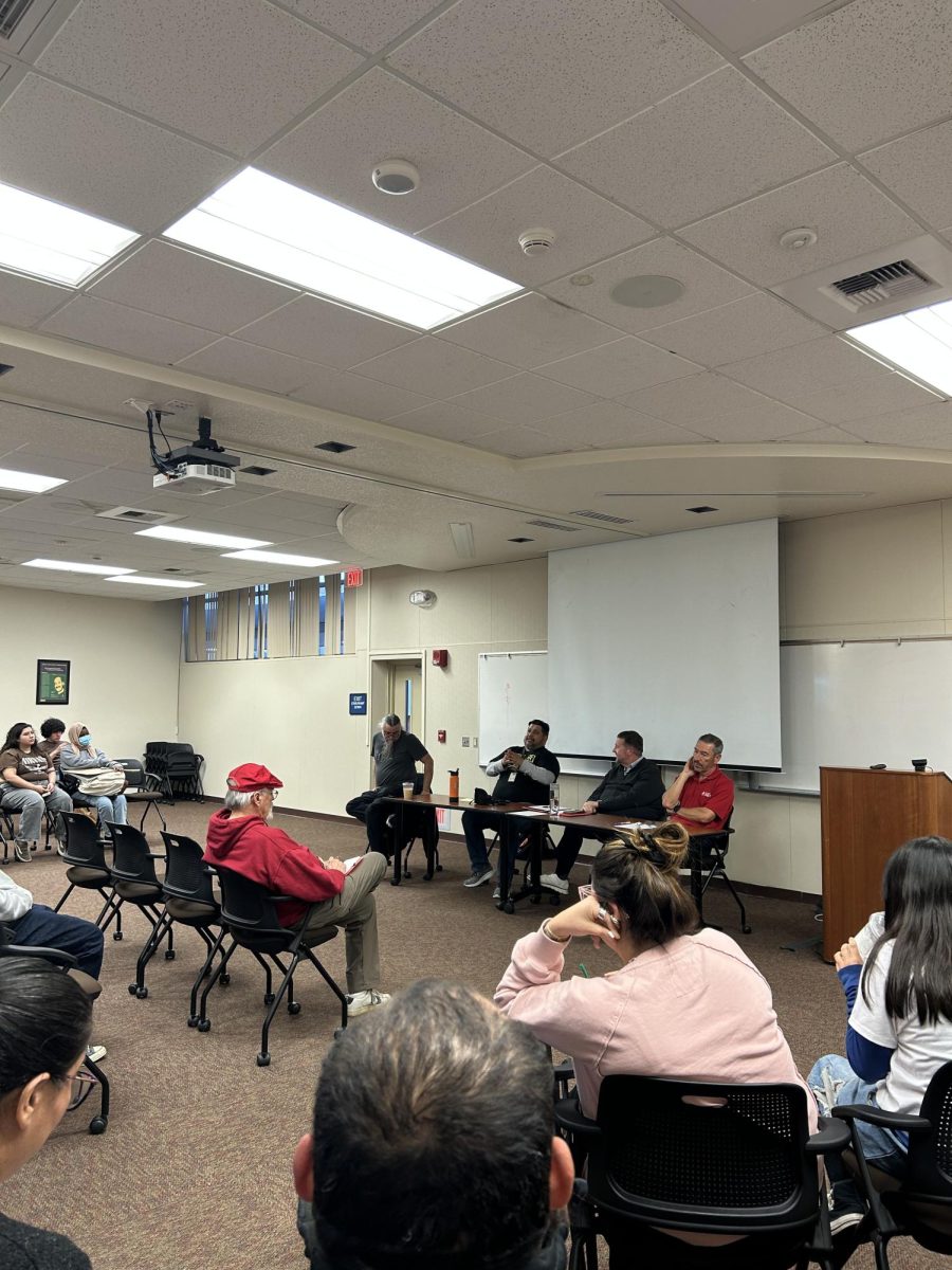 From left, Professor Reggie Williams, Professor Javier Llamas, Professor Matthew Maddex and Professor Joe Saldivar in a vertical image discussing the Department of Education Panel at the Levan Center on March 12.