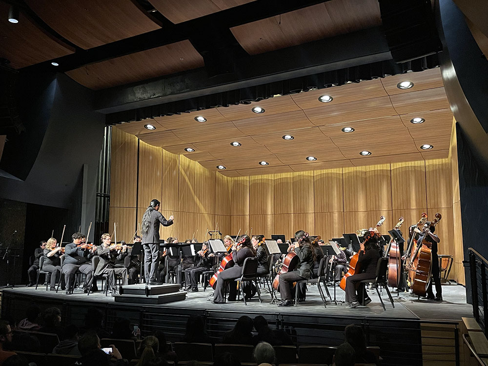 Dr. Leo Sakamoto guides his students through a powerful performance. 